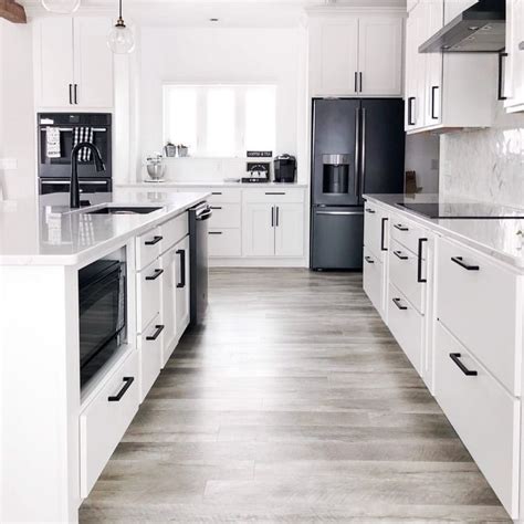 black stainless steel white cabinets|black stainless steel hardware.